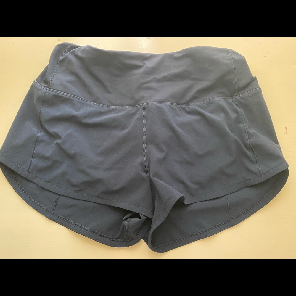 LuLu Lemon “speed up” shorts. Size 6. Navy blue. Lightly worn, great condition.